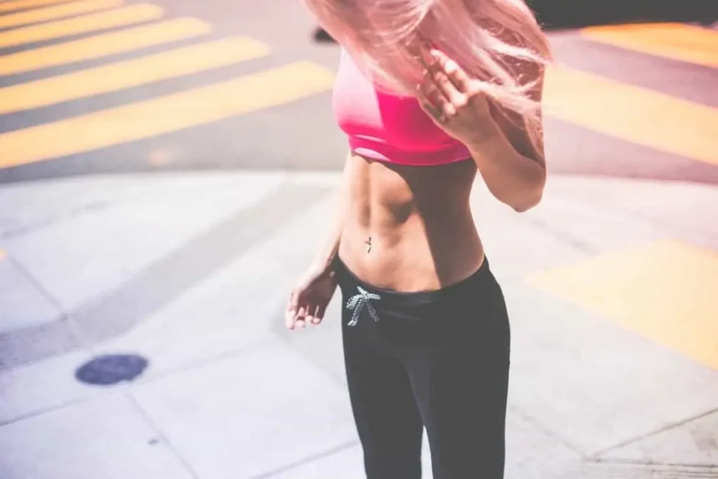 Woman with toned stomach after LA-EMS Body Sculpting Treatment Wallingford